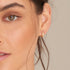 Gold Smooth Twist Huggie Hoop Earrings